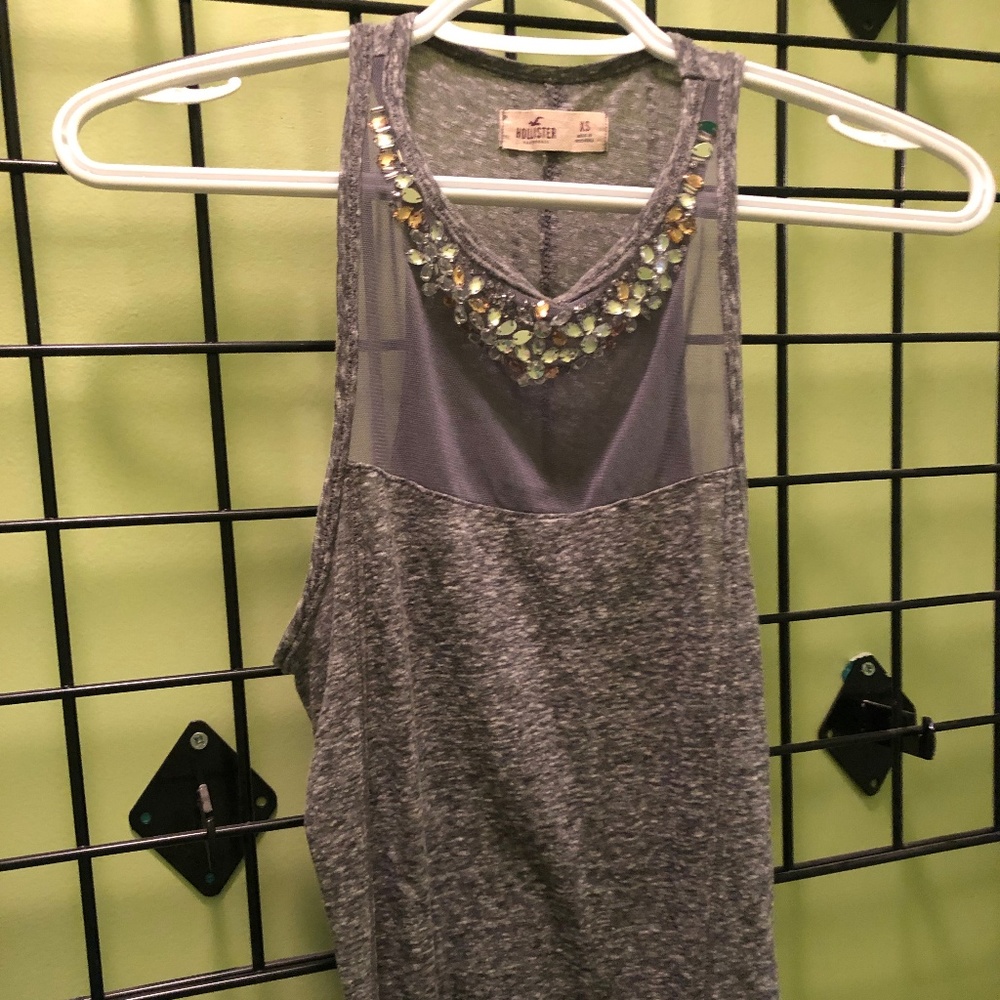 Grey tanktop with mesh and sequins on the neckline